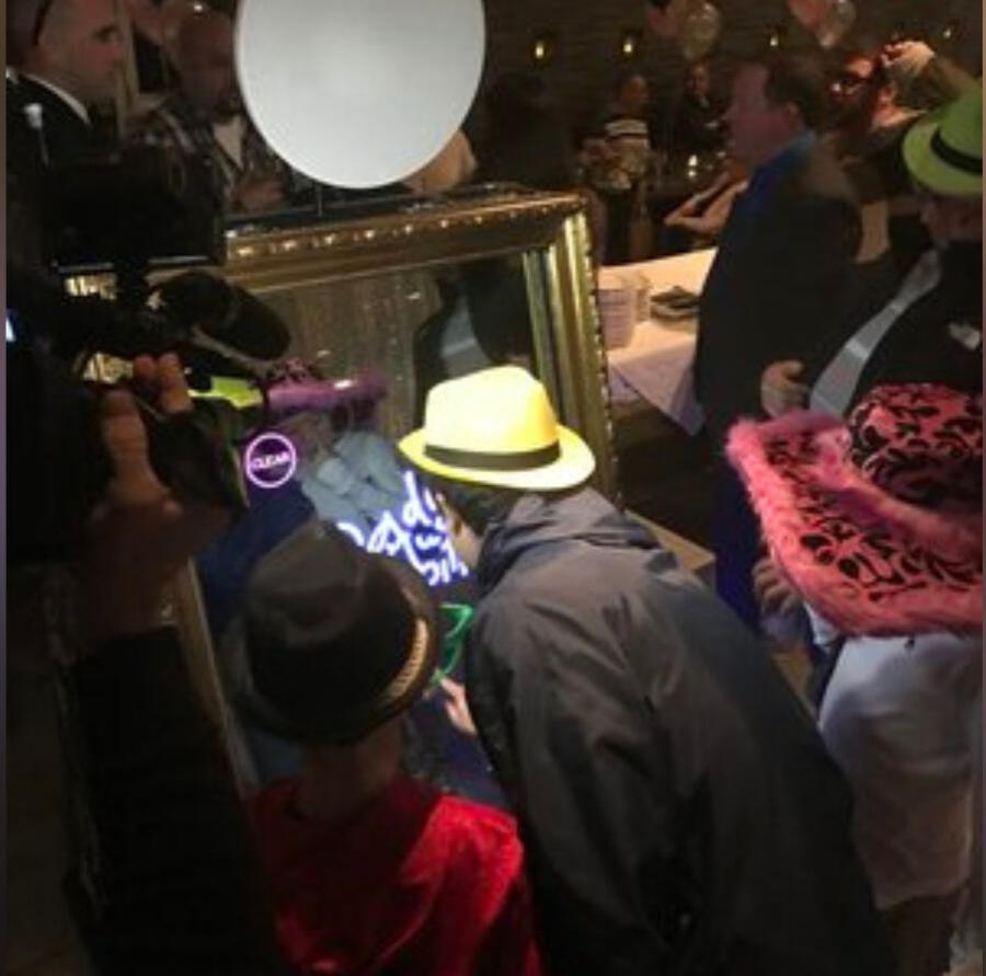 Large group enjoying AbsoLOUte Trivia night hosted by DJ Lou DiMarco at a House of Brews in Turnersville, with players from Crosskeys Skydiveing gathered around tables, laughing, playing trivia, and having drinks during a live event.